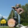 Squamish Days Festival featuring loggers sports. This 30-40 foot tall lumberjack can be found  beside the Squamish Adventure Center in Squamish, British Columbia Canada.