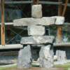 The 2010 Olympic symbol, "the  Inukshuk", outside of the Squamish Adventure Center in Squamish, British Columbia Canada.